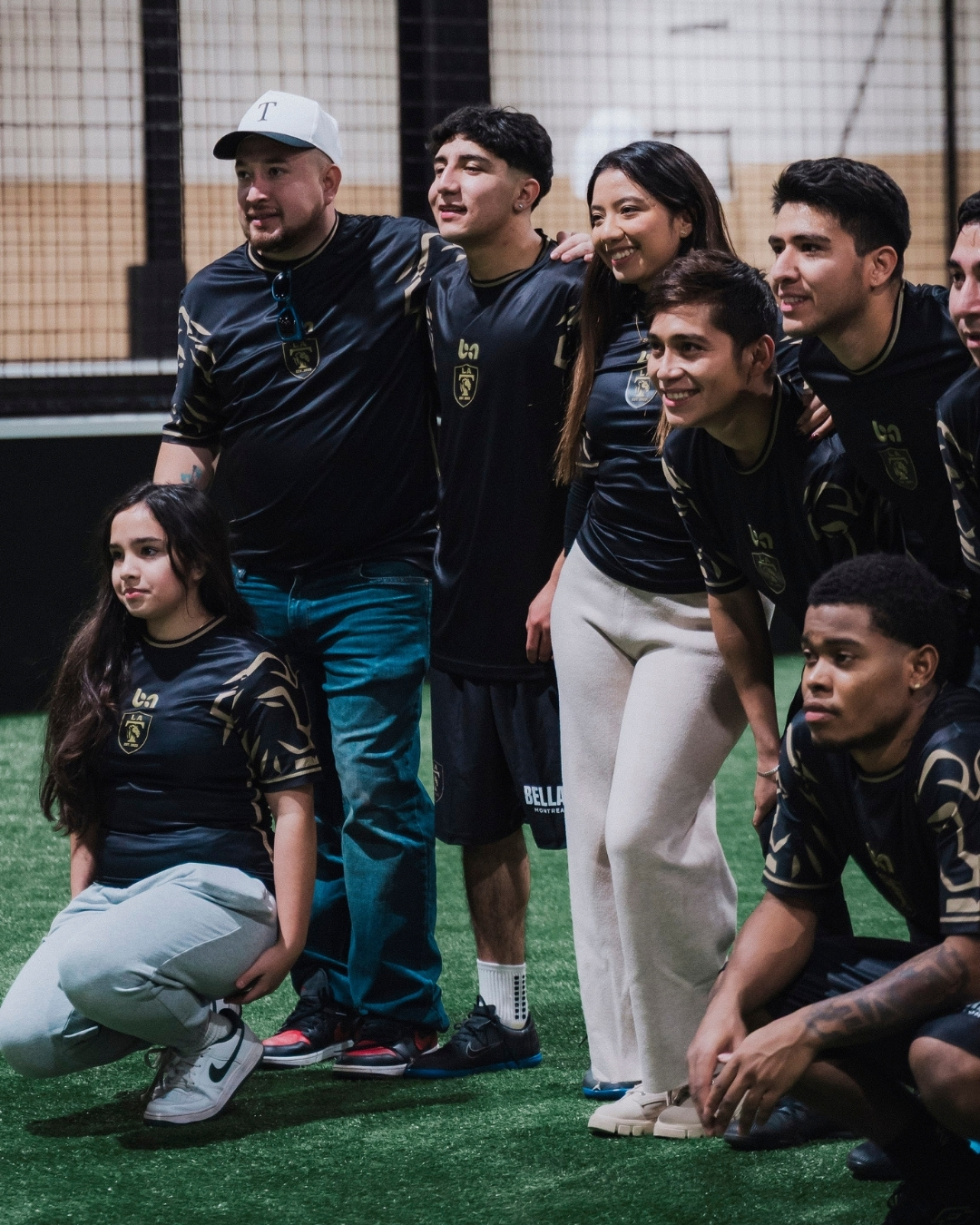 custom soccer team coaches supporters ba Gear black uniforms indoor field group photo