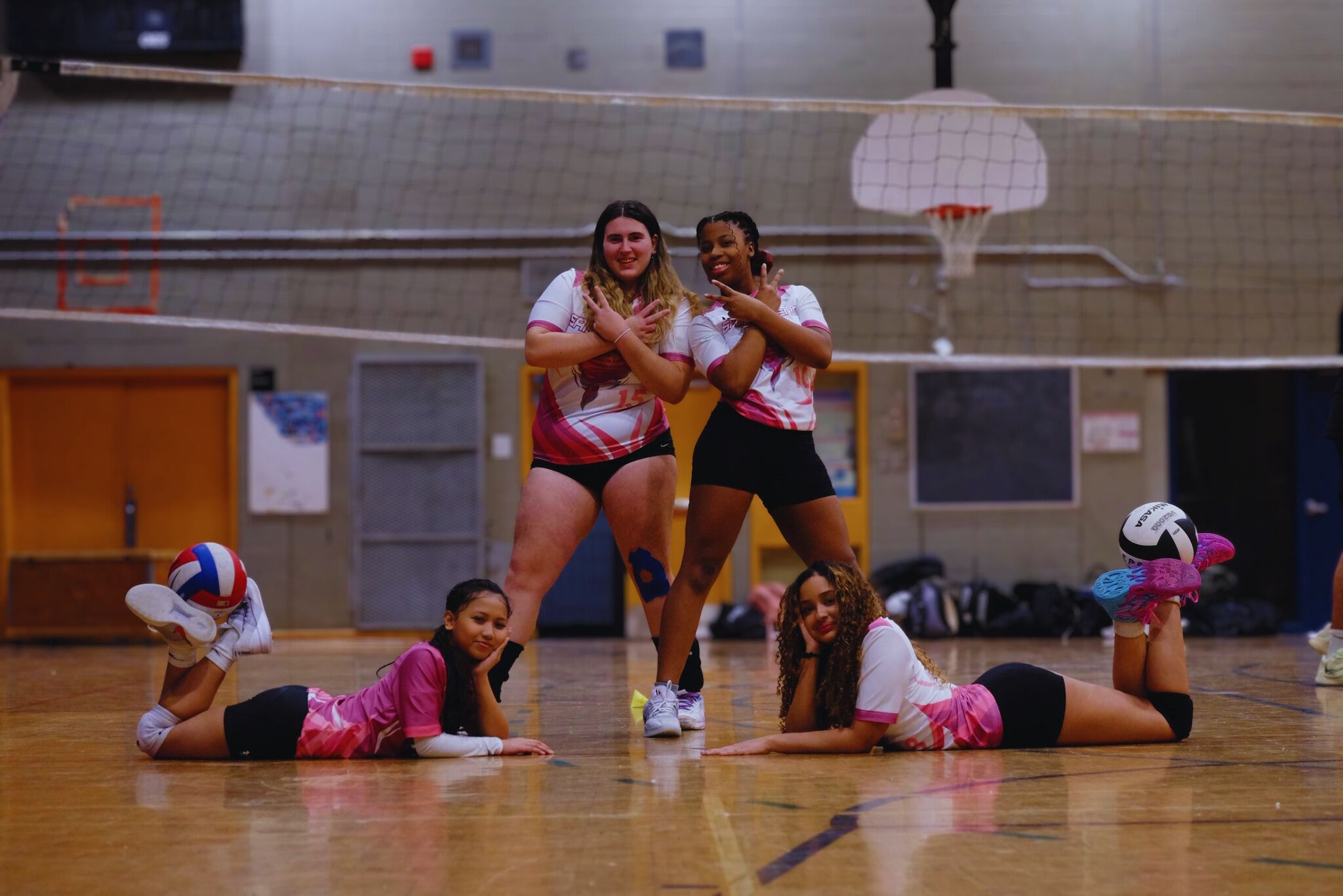 custom women’s volleyball team jerseys Montreal pink white uniforms ba Gear indoor court team photo